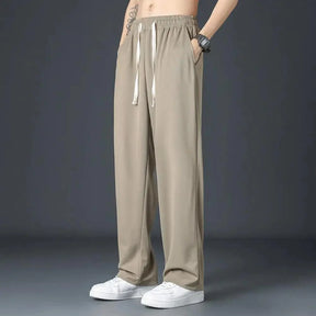 (Compre 2 e Leve 3) Calça Unissex Urban™ em Tecido Seda Gelo com Secagem Rápida / A Escolha Ideal para Pessoas que Priorizam Estilo e Conforto!